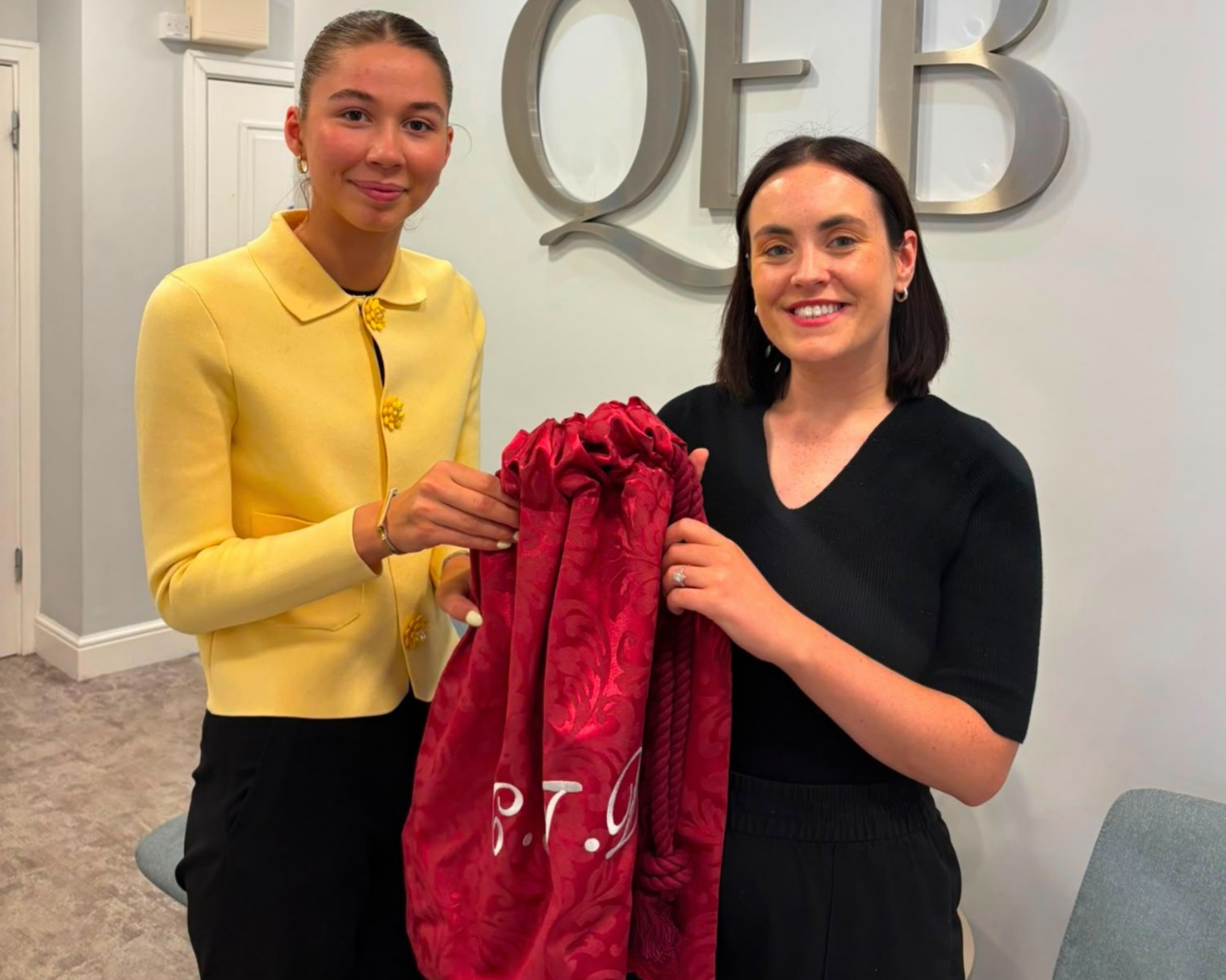 cara-donegan-receives-a-red-bag